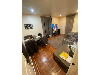 Renovated 1-bedroom, 1-bath co-op featuring a bright living and - photo 1