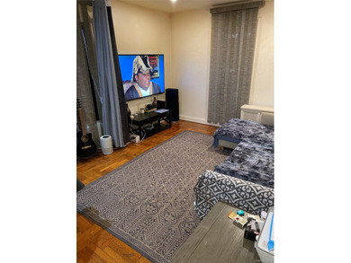 Renovated 1-bedroom, 1-bath co-op featuring a bright living and - photo 3