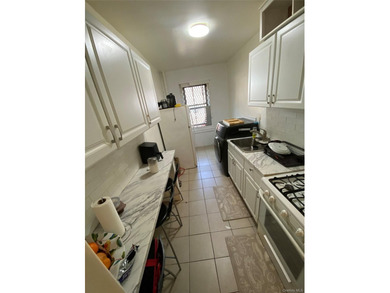 Renovated 1-bedroom, 1-bath co-op featuring a bright living and - photo 5