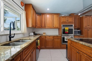 This home truly has it all! Located beachside Ormond Beach, this - photo 22