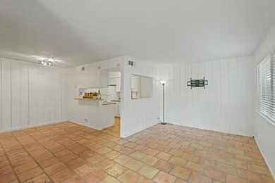 Welcome to Lakewood Village! This charming end-unit condo offers - photo 3