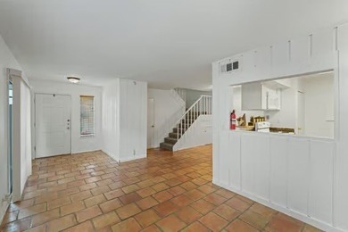 Welcome to Lakewood Village! This charming end-unit condo offers - photo 4