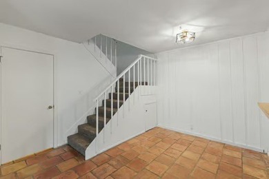 Welcome to Lakewood Village! This charming end-unit condo offers - photo 7