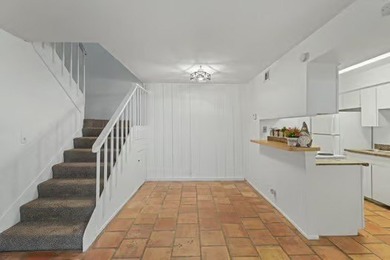 Welcome to Lakewood Village! This charming end-unit condo offers - photo 8