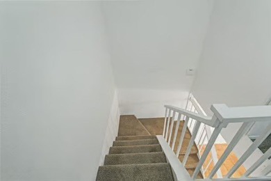Welcome to Lakewood Village! This charming end-unit condo offers - photo 10