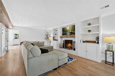 Tucked into a private wooded lot with a stunning lake view in - photo 24