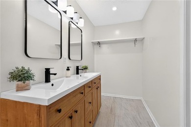 Tucked into a private wooded lot with a stunning lake view in - photo 36