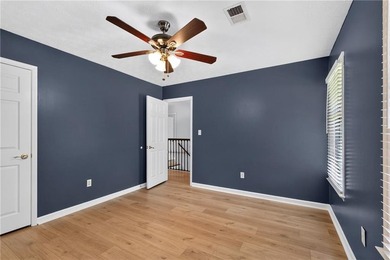 Tucked into a private wooded lot with a stunning lake view in - photo 40