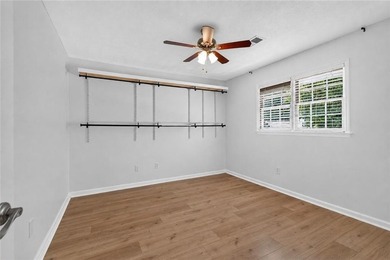 Tucked into a private wooded lot with a stunning lake view in - photo 41