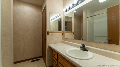 Welcome to lake life in this warm and inviting lakefront home - photo 11