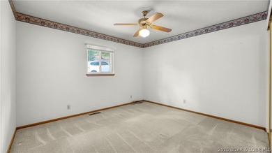 Welcome to lake life in this warm and inviting lakefront home - photo 12