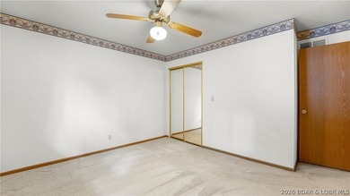 Welcome to lake life in this warm and inviting lakefront home - photo 13