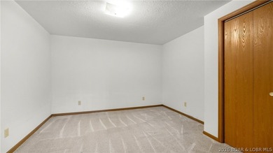 Welcome to lake life in this warm and inviting lakefront home - photo 22