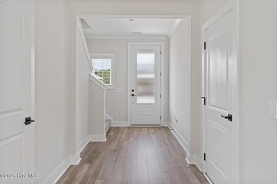 The Camden is a thoughtfully designed two-story home featuring - photo 3
