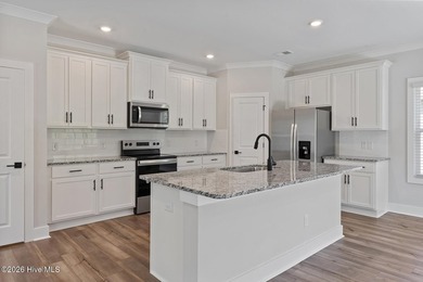 The Camden is a thoughtfully designed two-story home featuring - photo 5