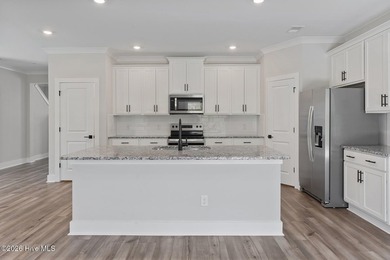 The Camden is a thoughtfully designed two-story home featuring - photo 6