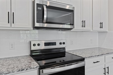 The Camden is a thoughtfully designed two-story home featuring - photo 8