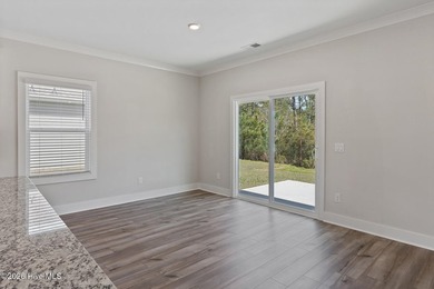 The Camden is a thoughtfully designed two-story home featuring - photo 9