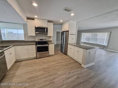 Step into a home that feels brand new. This stunning 3-bedroom - photo 7