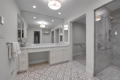Set within the coveted Estates II gated community in Manhasset - photo 19