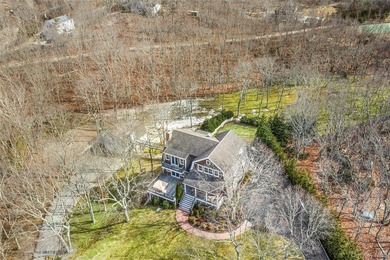 Welcome to 22 Old Trail Road, a charming beach cottage-style - photo 3