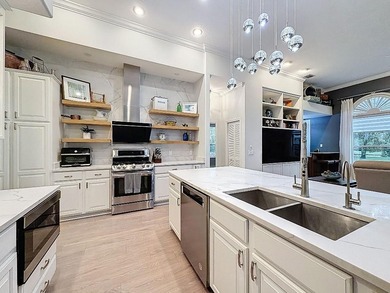 Discover a hidden Tampa area gem in the sought after gated - photo 21
