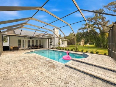 Discover a hidden Tampa area gem in the sought after gated - photo 54