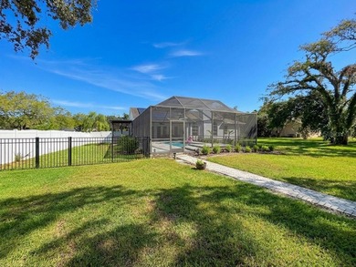 Discover a hidden Tampa area gem in the sought after gated - photo 55
