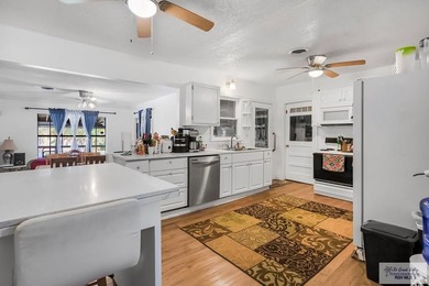 Welcome to this beautifully updated 3-bedroom, 2-bath home in an - photo 5