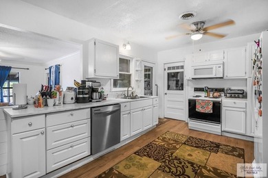 Welcome to this beautifully updated 3-bedroom, 2-bath home in an - photo 6
