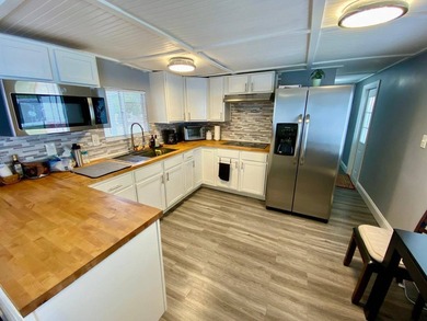 Discover this beautiful mobile home located in a wonderful 55+ - photo 7