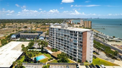 Wake up to sweeping ocean views from this beautifully refreshed - photo 2