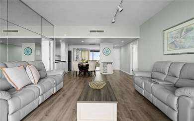 Wake up to sweeping ocean views from this beautifully refreshed - photo 5