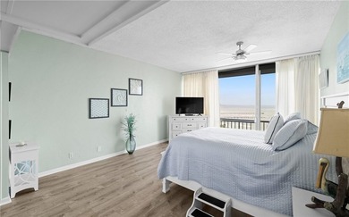 Wake up to sweeping ocean views from this beautifully refreshed - photo 10