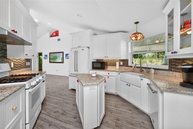 Welcome to this distinctive Key West-style home located in the - photo 12