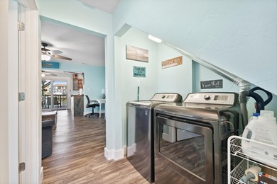 Waterfront living meets beach lifestyle in this beautifully - photo 15