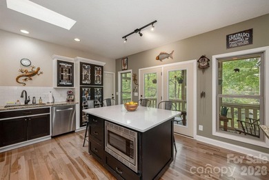 LAKEFRONT living and mountain tranquility in this beautifully - photo 21