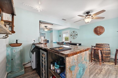 Waterfront living meets beach lifestyle in this beautifully - photo 22