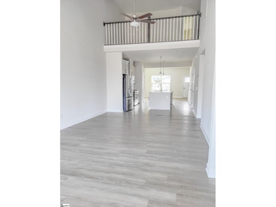 SHORT SALE  Well-maintained townhome near the back of the