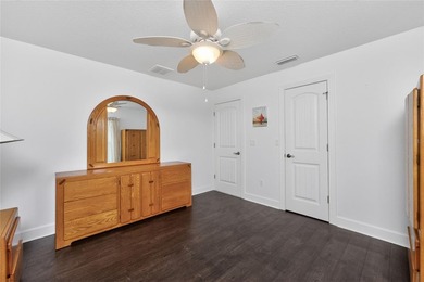 Welcome to this distinctive Key West-style home located in the - photo 23