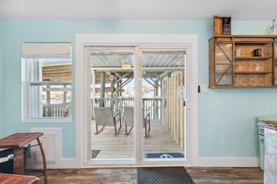 Waterfront living meets beach lifestyle in this beautifully - photo 24