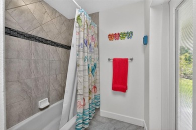 Welcome to this distinctive Key West-style home located in the - photo 25
