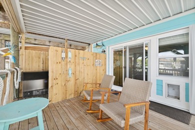 Waterfront living meets beach lifestyle in this beautifully - photo 27
