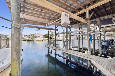 Waterfront living meets beach lifestyle in this beautifully - photo 31