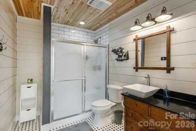 LAKEFRONT living and mountain tranquility in this beautifully - photo 32