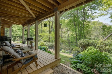 LAKEFRONT living and mountain tranquility in this beautifully - photo 35