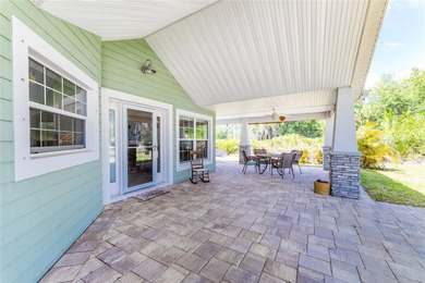 Welcome to this distinctive Key West-style home located in the - photo 36