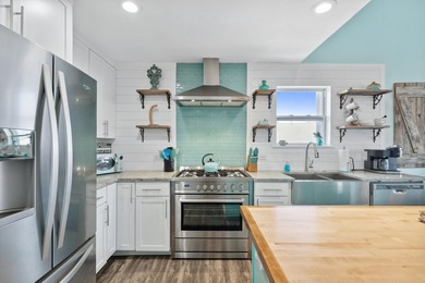 Waterfront living meets beach lifestyle in this beautifully - photo 40