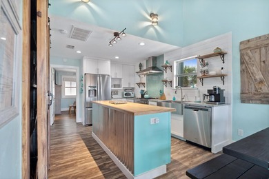 Waterfront living meets beach lifestyle in this beautifully - photo 41