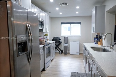 Here is a great opportunity to own a fully remodeled home in The - photo 7
